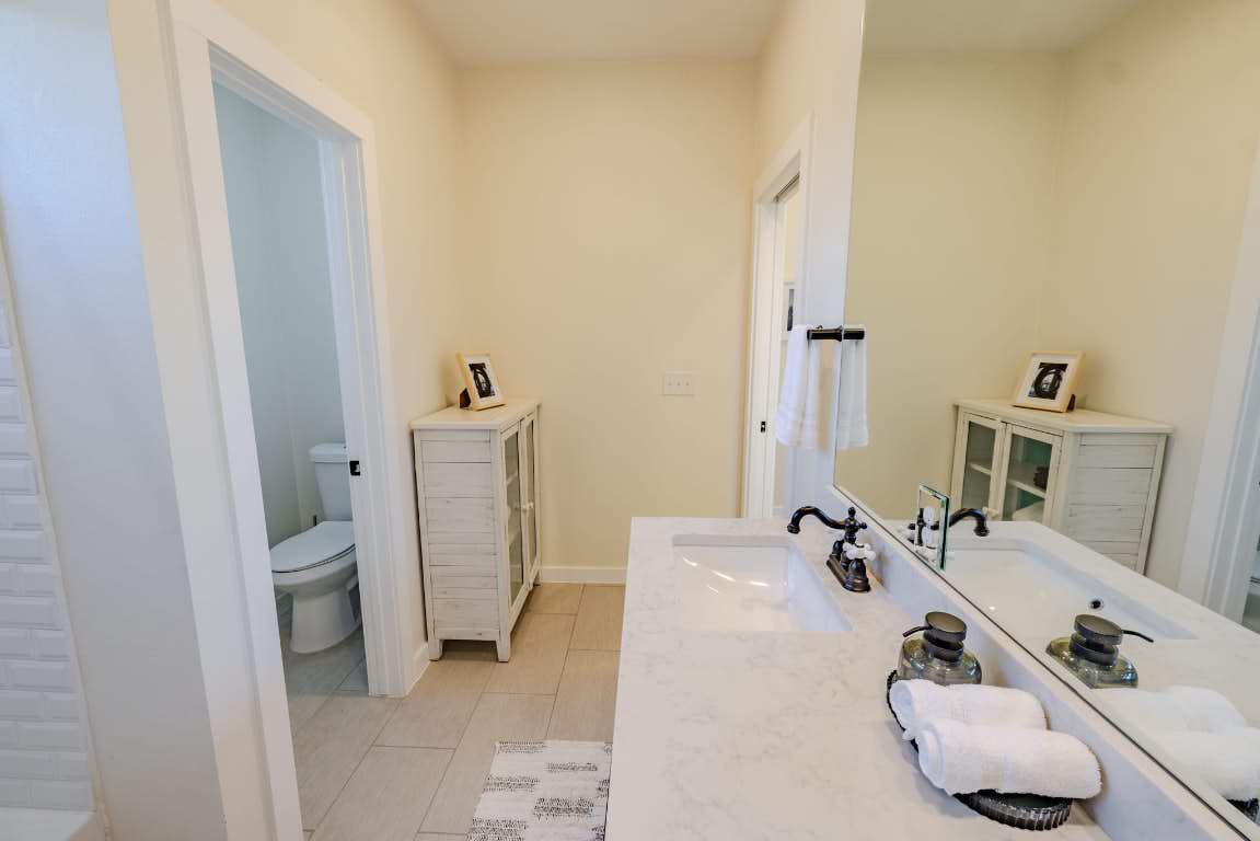 7609 Bennett Avenue, Unit A Austin, TX 78752 - Photo 12 of 20 Bathroom featuring vanity and light tile patterned floors