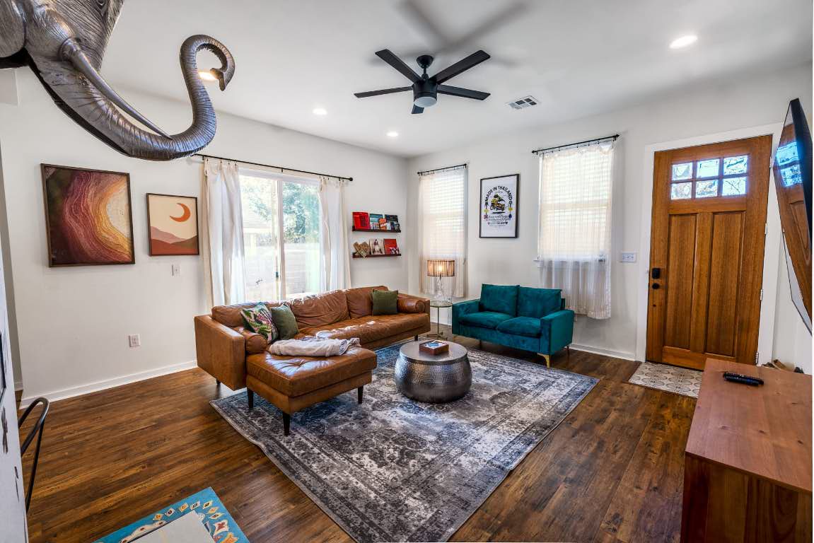 7609 Bennett Avenue, Unit A Austin, TX 78752 - Photo 4 of 20 Living area with dark wood-type flooring, a ceiling fan, and recessed lighting