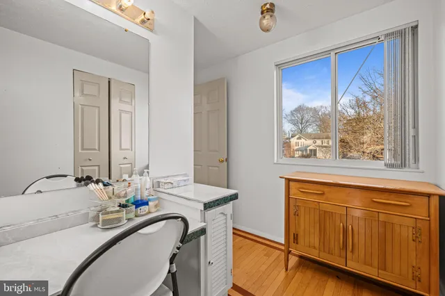 a bathroom with a sink and a window