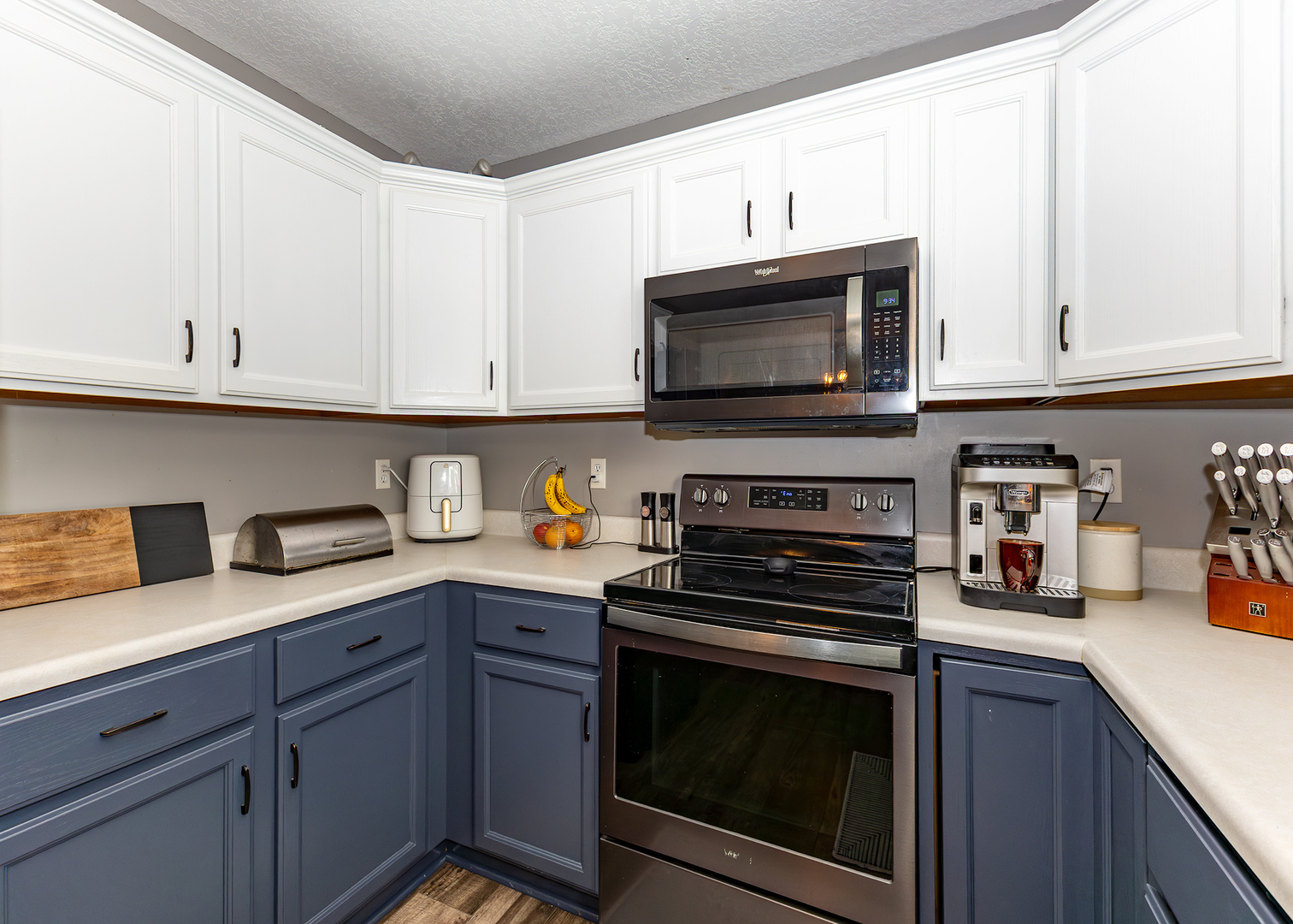 57 Deer Path Court Geneseo, IL 61254 - Photo 11 of 32 a kitchen with granite countertop cabinets stainless steel appliances and a counter space