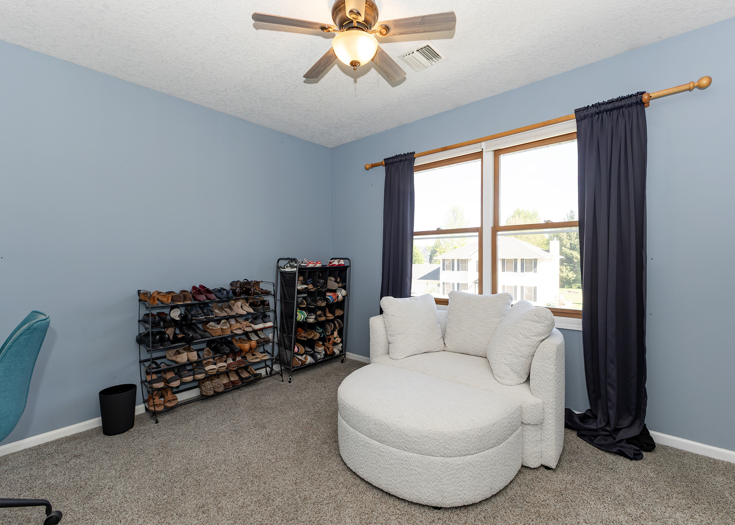 57 Deer Path Court Geneseo, IL 61254 - Photo 15 of 32 a living room with furniture and a large window