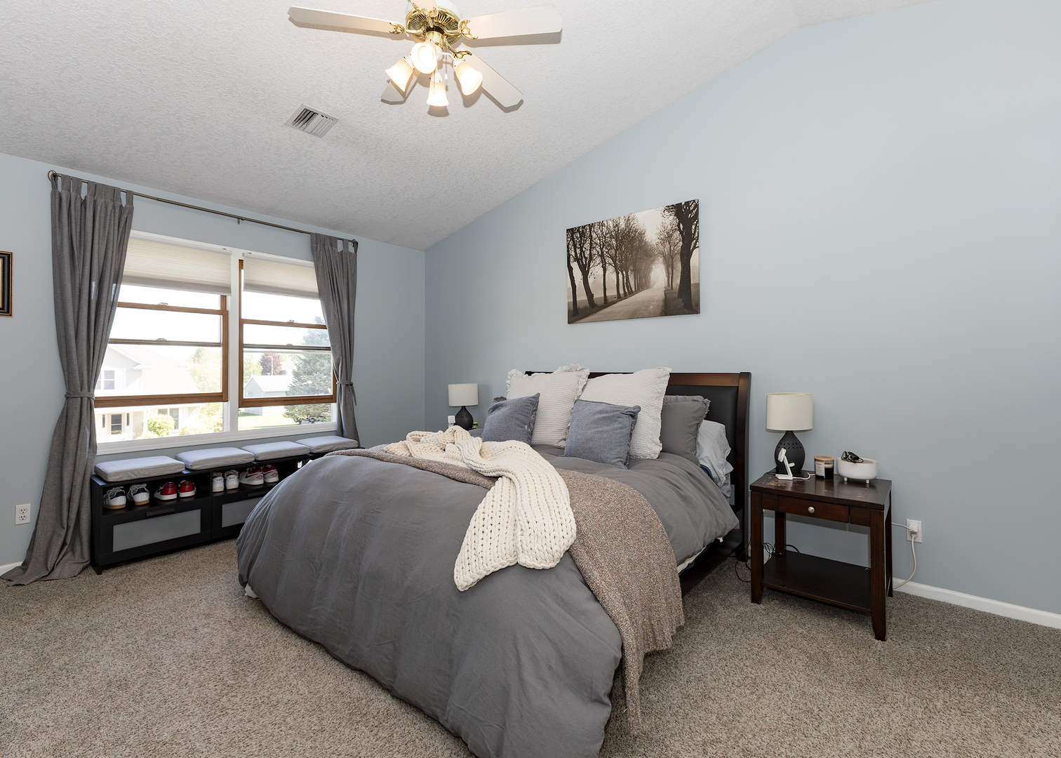 57 Deer Path Court Geneseo, IL 61254 - Photo 21 of 32 a spacious bedroom with a bed and a window