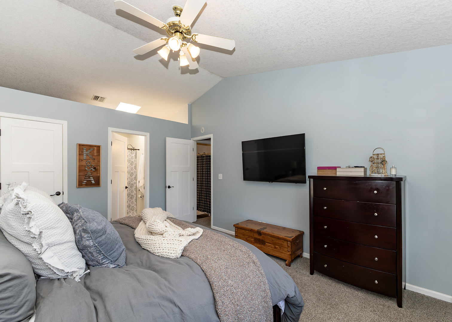 57 Deer Path Court Geneseo, IL 61254 - Photo 22 of 32 a bedroom with a bed and a flat screen tv