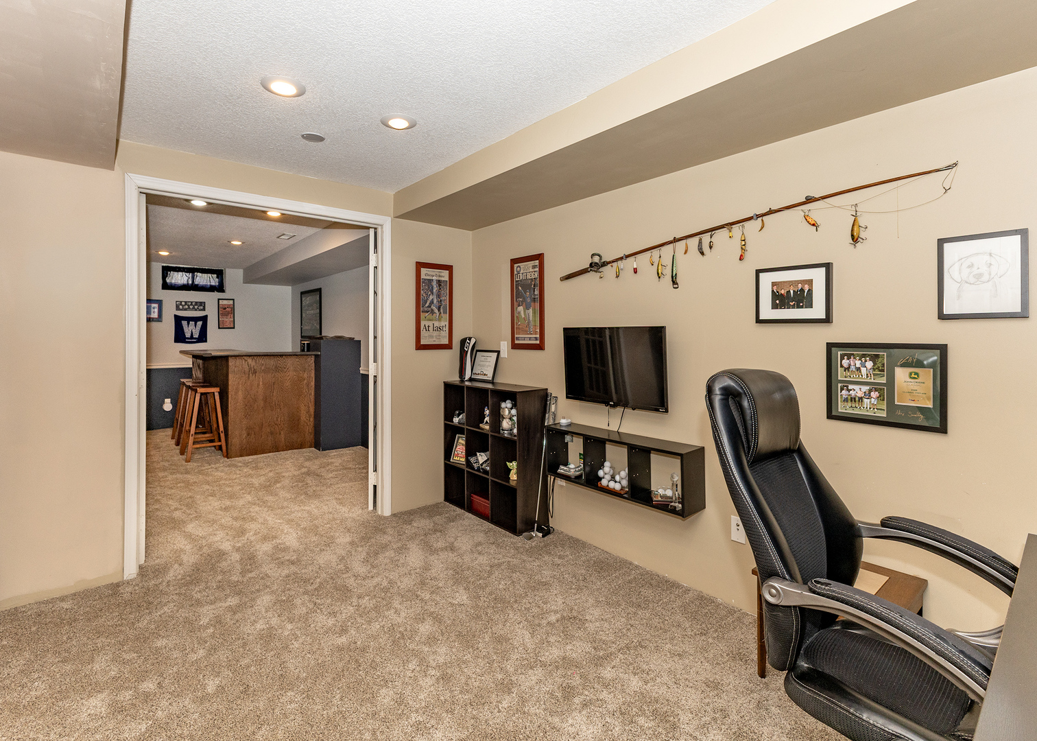 57 Deer Path Court Geneseo, IL 61254 - Photo 28 of 32 a view of a livingroom with furniture and a flat screen tv