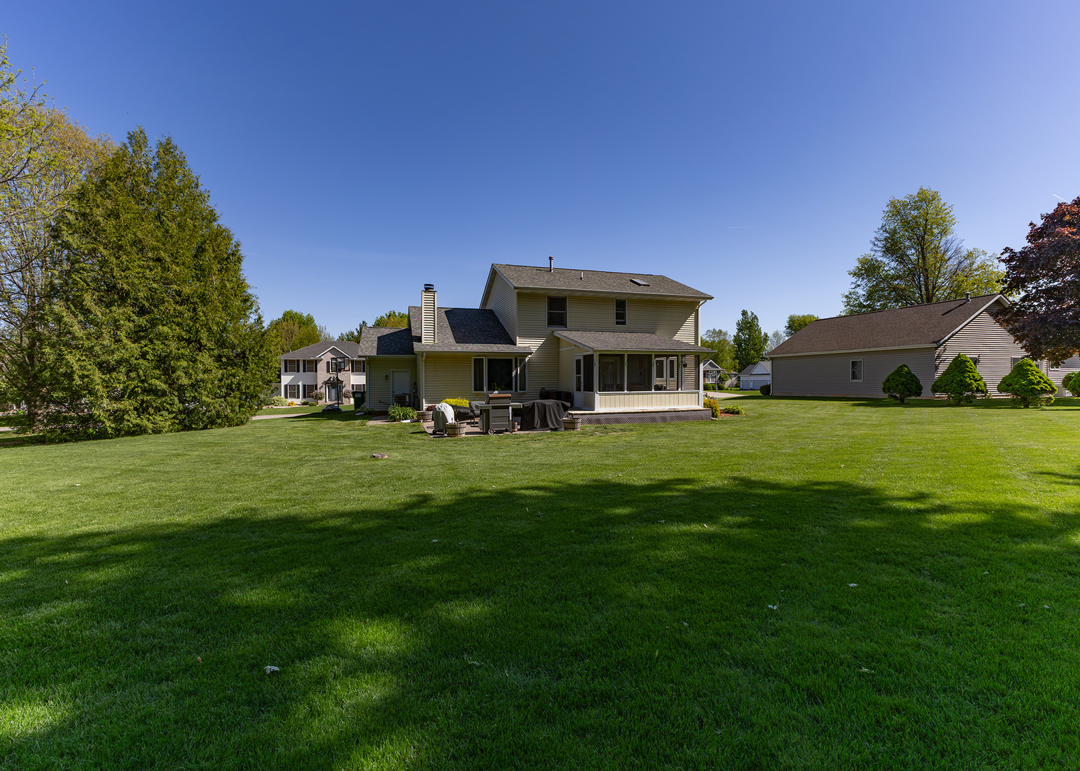 57 Deer Path Court Geneseo, IL 61254 - Photo 31 of 32 a view of a house with a big yard
