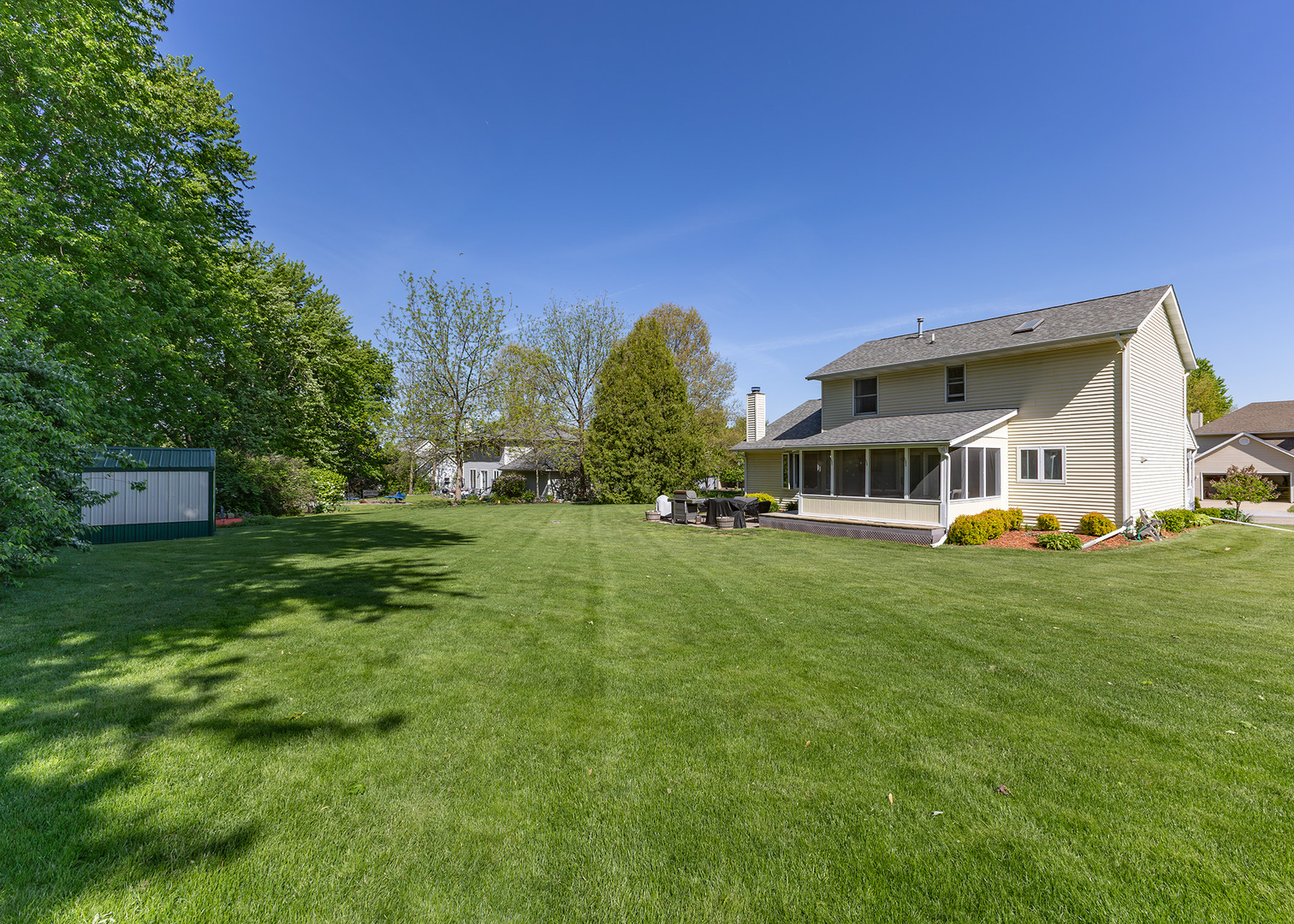 57 Deer Path Court Geneseo, IL 61254 - Photo 32 of 32 a front view of a house with garden