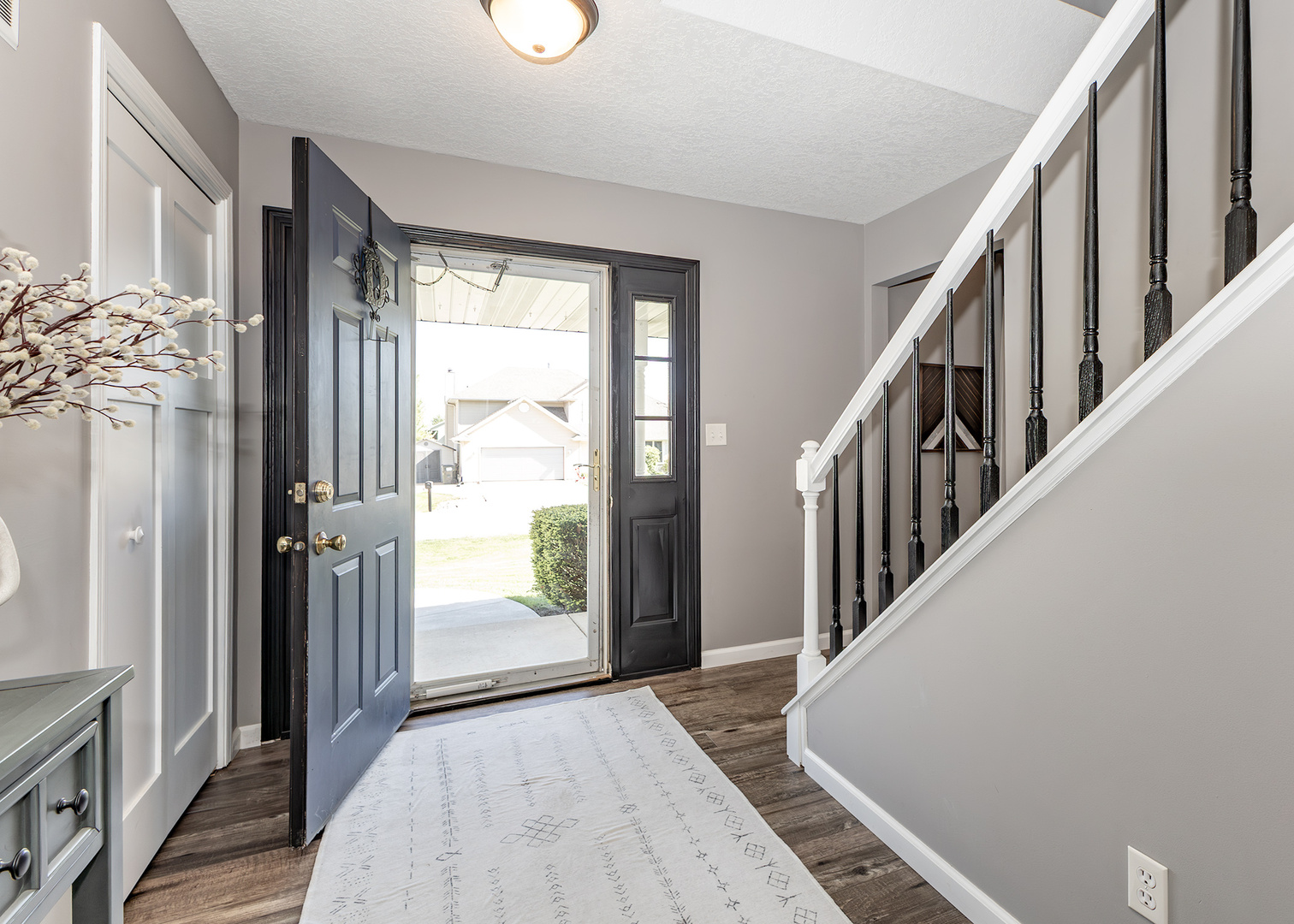57 Deer Path Court Geneseo, IL 61254 - Photo 4 of 32 a view of an entryway with wooden floor and garden