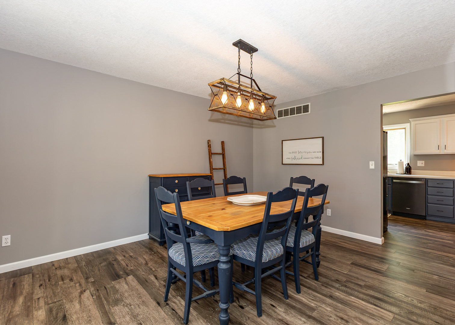 57 Deer Path Court Geneseo, IL 61254 - Photo 5 of 32 a view of a dining room with furniture wooden floor and chandelier