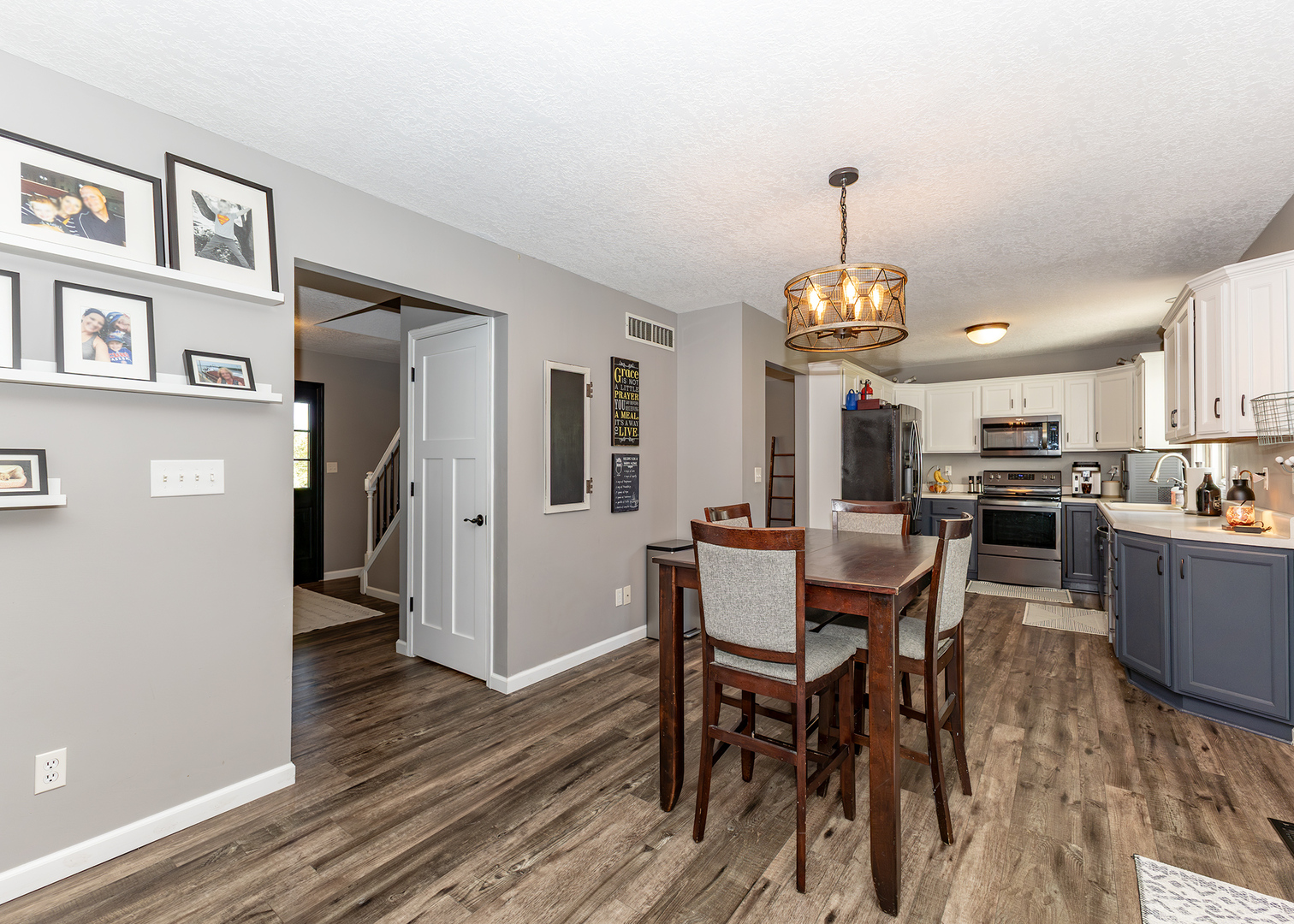 57 Deer Path Court Geneseo, IL 61254 - Photo 10 of 32 a view of a dining room with furniture window and wooden floor