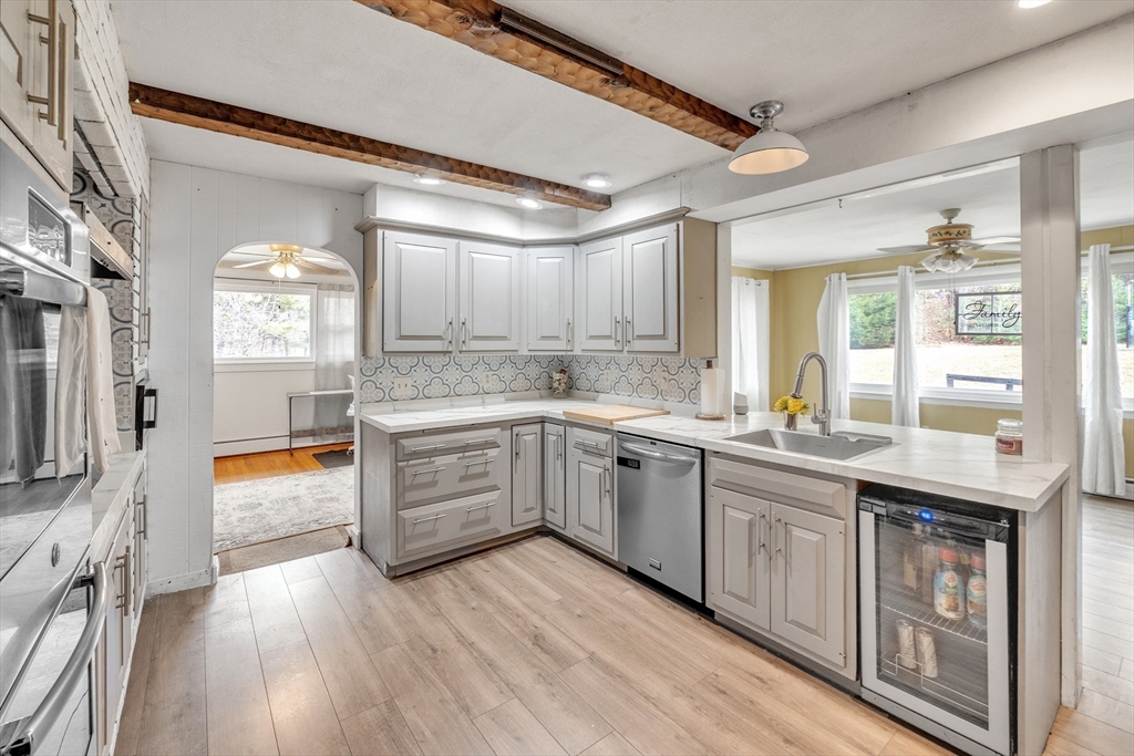 109 North Brookfield Road Barre, MA 01005 - Photo 3 of 42 a kitchen with stainless steel appliances granite countertop a lot of counter space and wooden floors