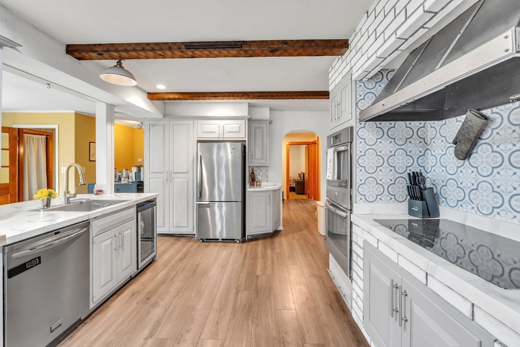 109 North Brookfield Road Barre, MA 01005 - Photo 5 of 42 a large kitchen with a lot of counter space and wooden floor