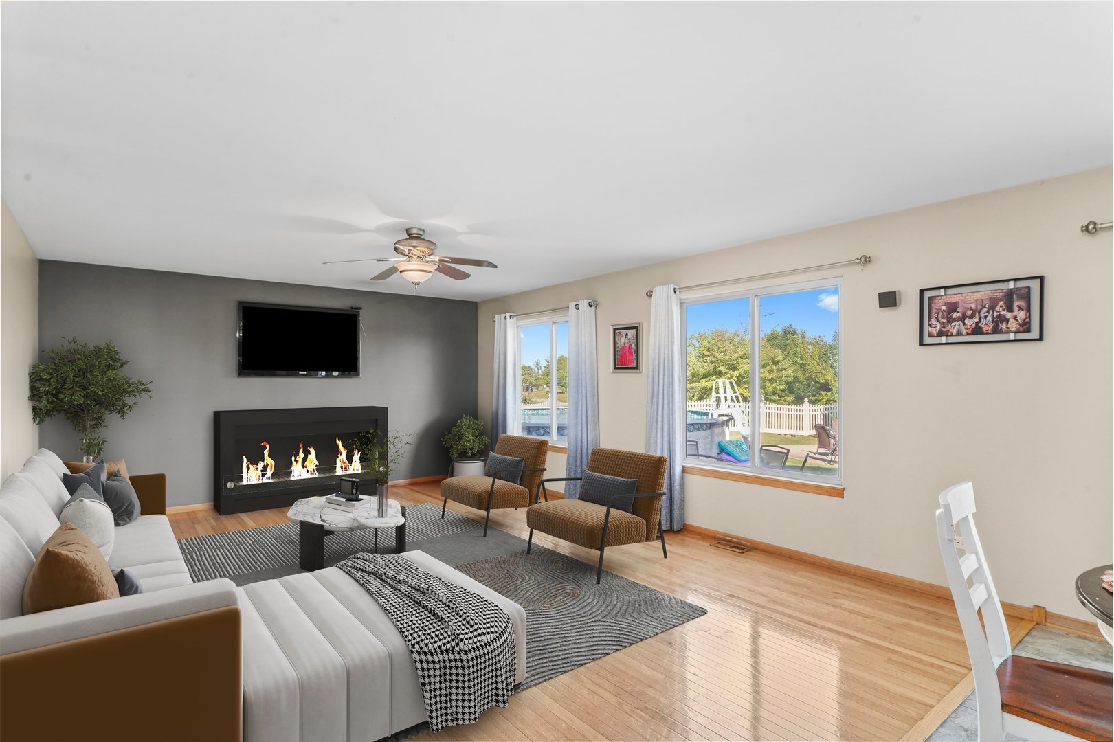 1514 Spring Oaks Drive Joliet, IL 60431 - Photo 11 of 36 a living room with furniture and a flat screen tv