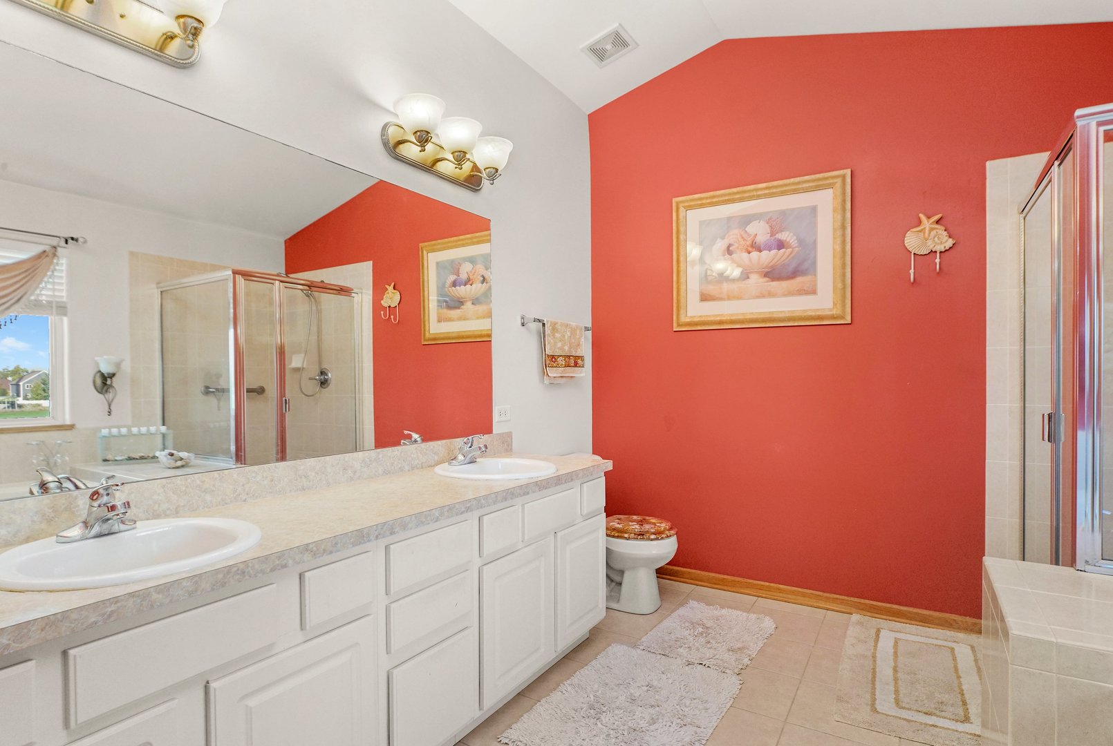 1514 Spring Oaks Drive Joliet, IL 60431 - Photo 16 of 36 a bathroom with a sink and a mirror