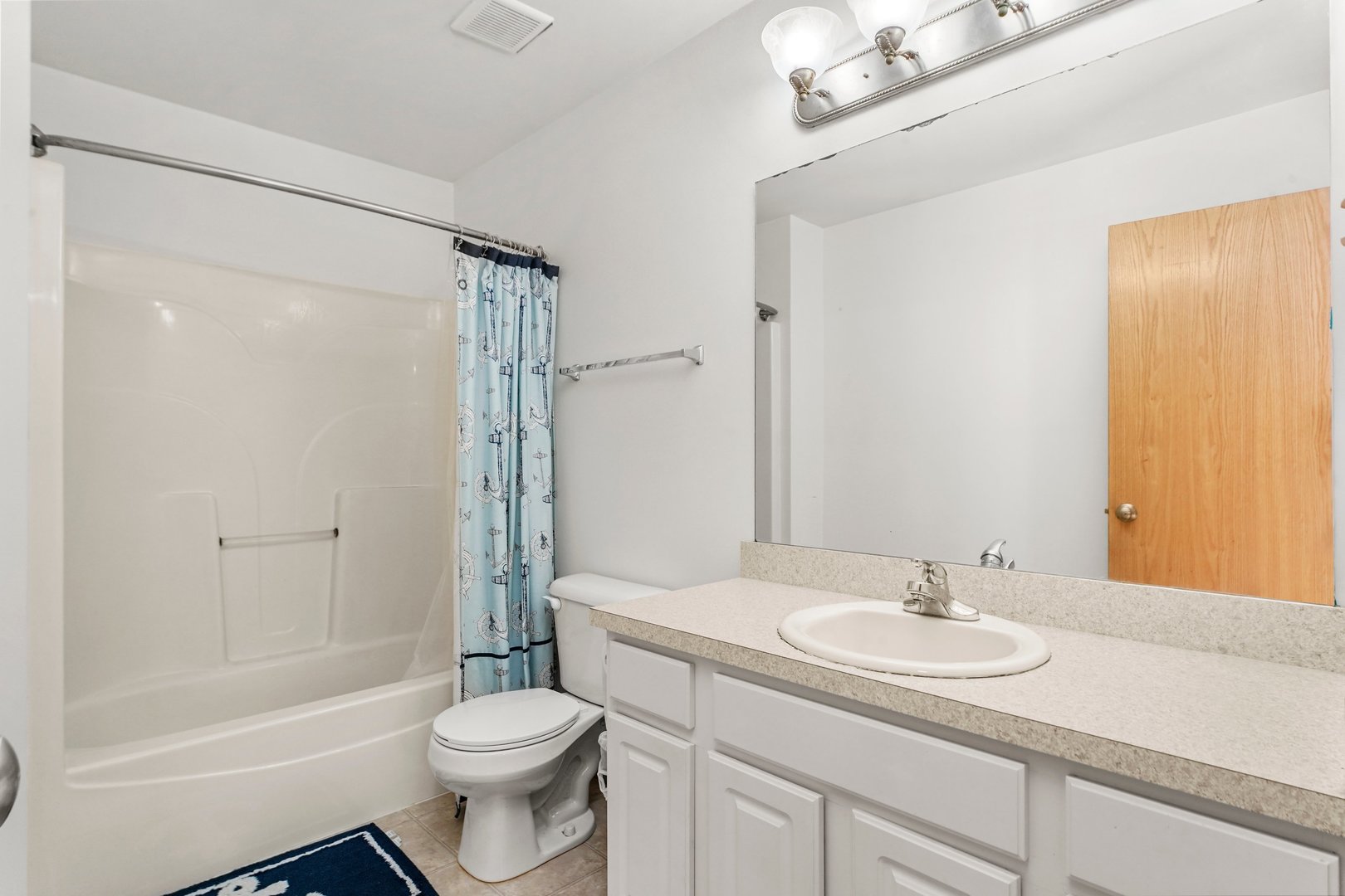 1514 Spring Oaks Drive Joliet, IL 60431 - Photo 20 of 36 a bathroom with a sink toilet and shower