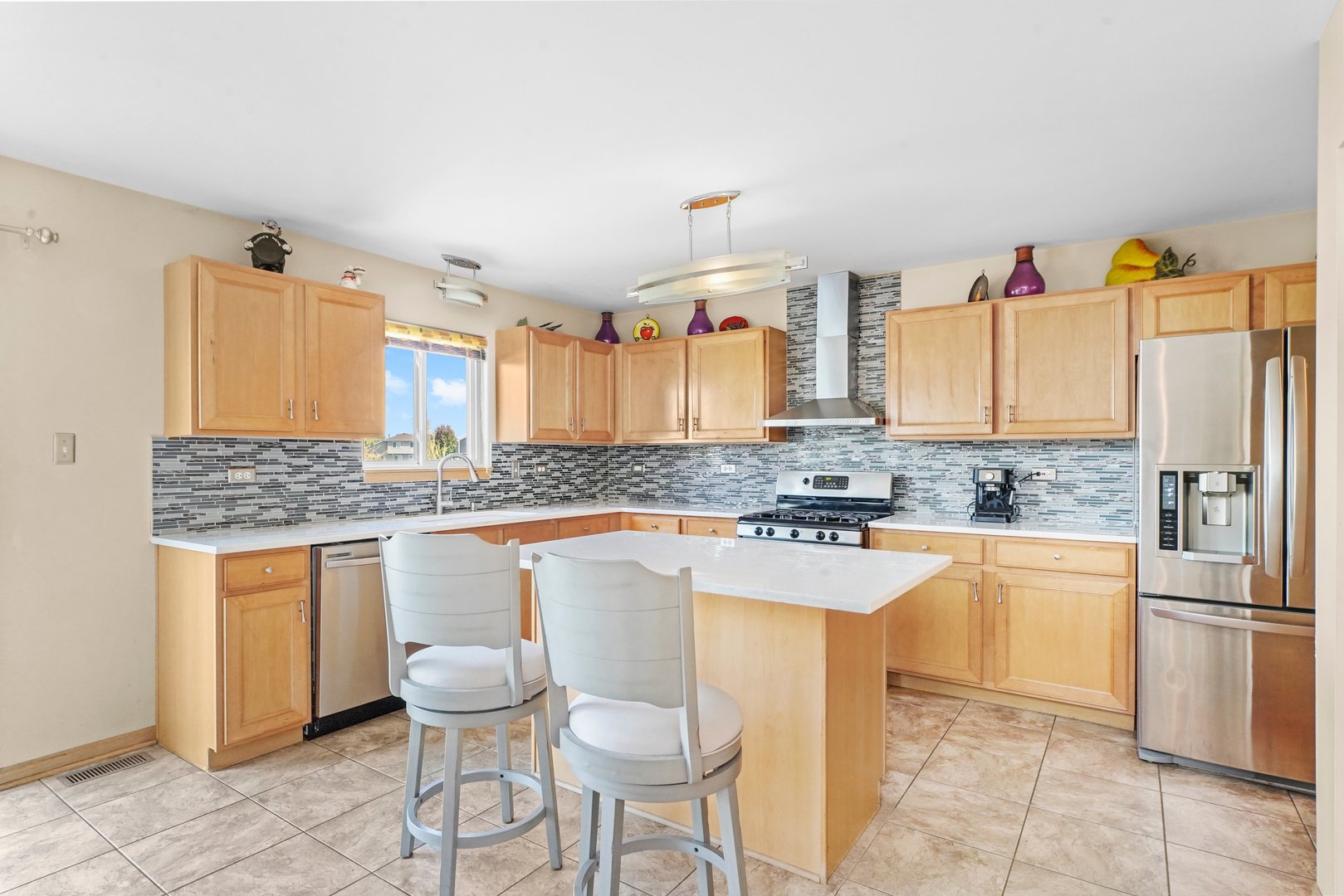 1514 Spring Oaks Drive Joliet, IL 60431 - Photo 9 of 36 a kitchen with a sink cabinets and counter space