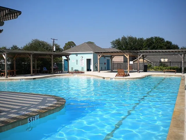 a view of outdoor space with sign board and lake view
