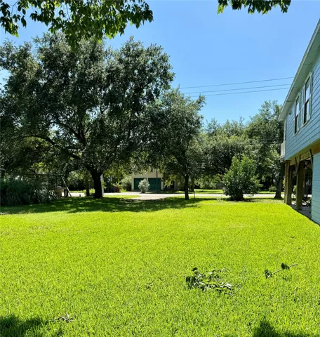 a view of swimming pool with an outdoor space and seating area