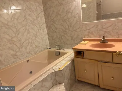 a bathroom with a sink and a bathtub