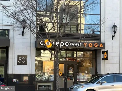 a front view of a building with retail shop