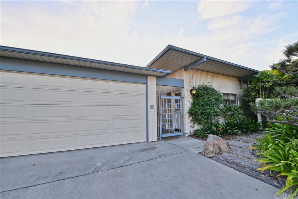 408 Monarch Bay Drive Dana Point, CA 92629 - Photo 10 of 42 a backyard of a house with plants and trees