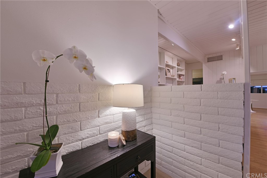 408 Monarch Bay Drive Dana Point, CA 92629 - Photo 14 of 42 a bathroom with a toilet a sink and mirror