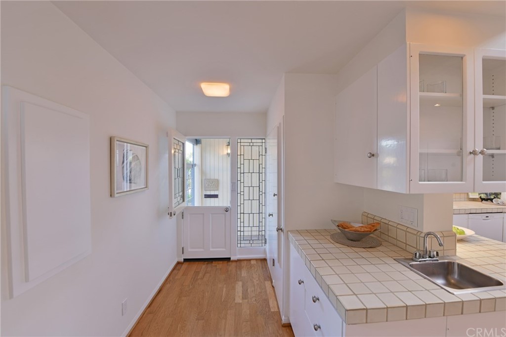 408 Monarch Bay Drive Dana Point, CA 92629 - Photo 18 of 42 a bathroom with a sink and a mirror