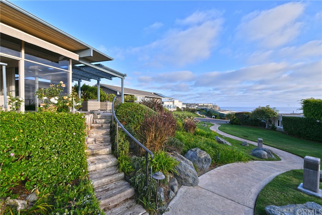 408 Monarch Bay Drive Dana Point, CA 92629 - Photo 28 of 42 a view of a garden with an outdoor seating