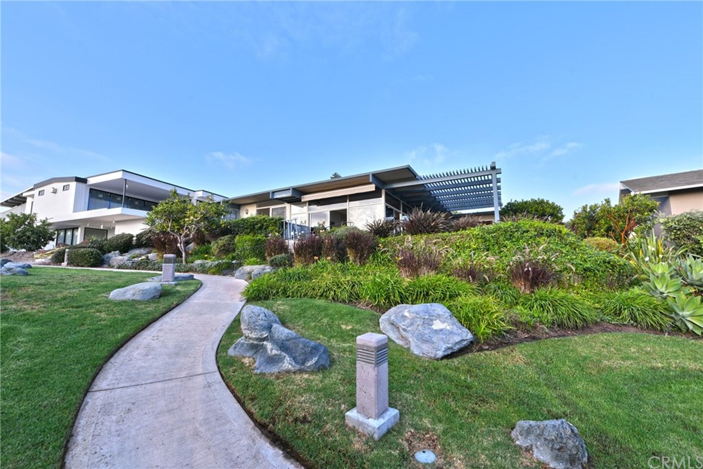 408 Monarch Bay Drive Dana Point, CA 92629 - Photo 34 of 42 a front view of a house with a yard