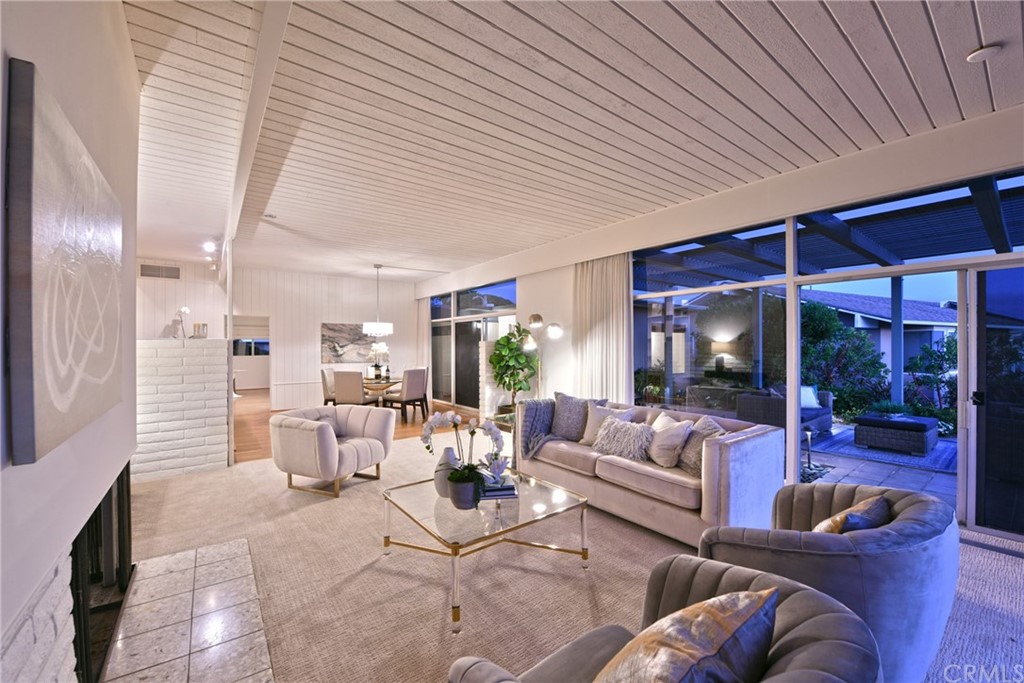 408 Monarch Bay Drive Dana Point, CA 92629 - Photo 4 of 42 a living room with furniture and a large window