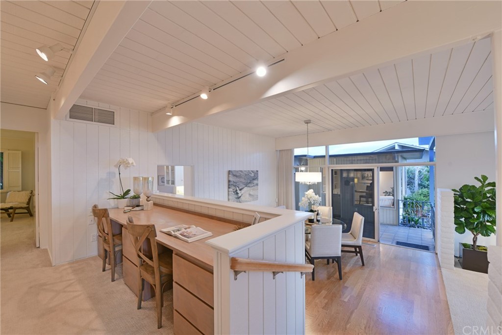 408 Monarch Bay Drive Dana Point, CA 92629 - Photo 7 of 42 a kitchen with a table and chairs in it
