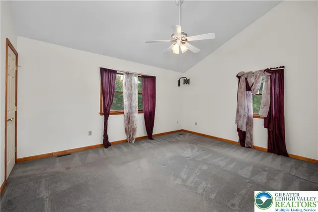 a view of an empty room with window