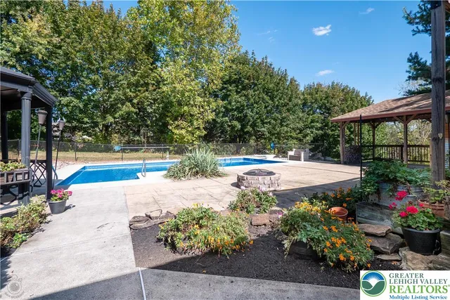 a view of a garden with a patio
