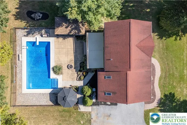 a picture of houses with outdoor seating