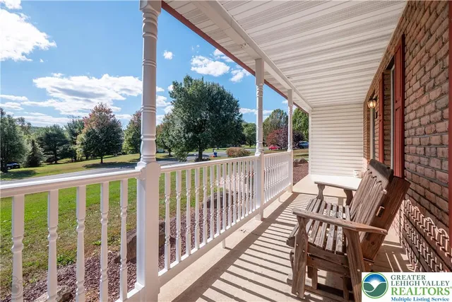 a view of a chairs on the roof deck