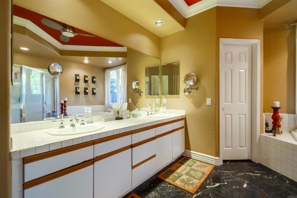 864 Del Mar Downs Road Solana Beach, CA 92075 - Photo 15 of 20 a bathroom with a sink and a mirror