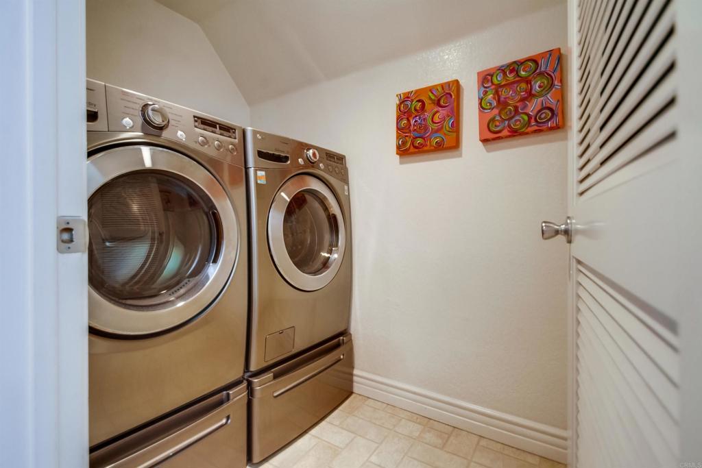 864 Del Mar Downs Road Solana Beach, CA 92075 - Photo 16 of 20 a utility room with dryer and washer