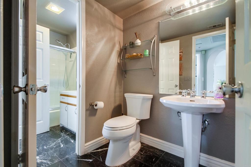 864 Del Mar Downs Road Solana Beach, CA 92075 - Photo 10 of 20 a bathroom with a sink toilet and shower