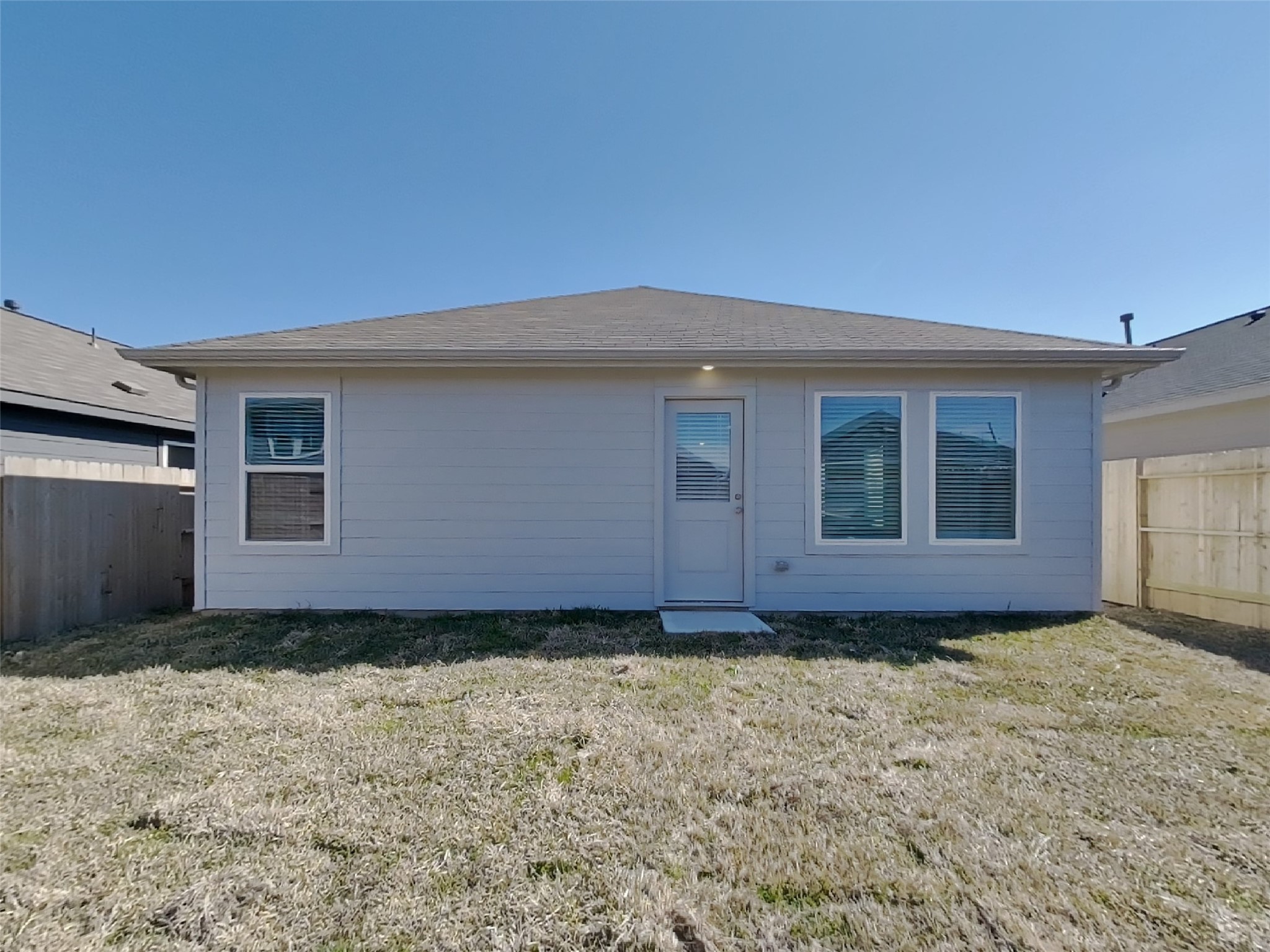 13035 Shells Lane Crosby, TX 77532 - Photo 17 of 17 a view of a house with a backyard