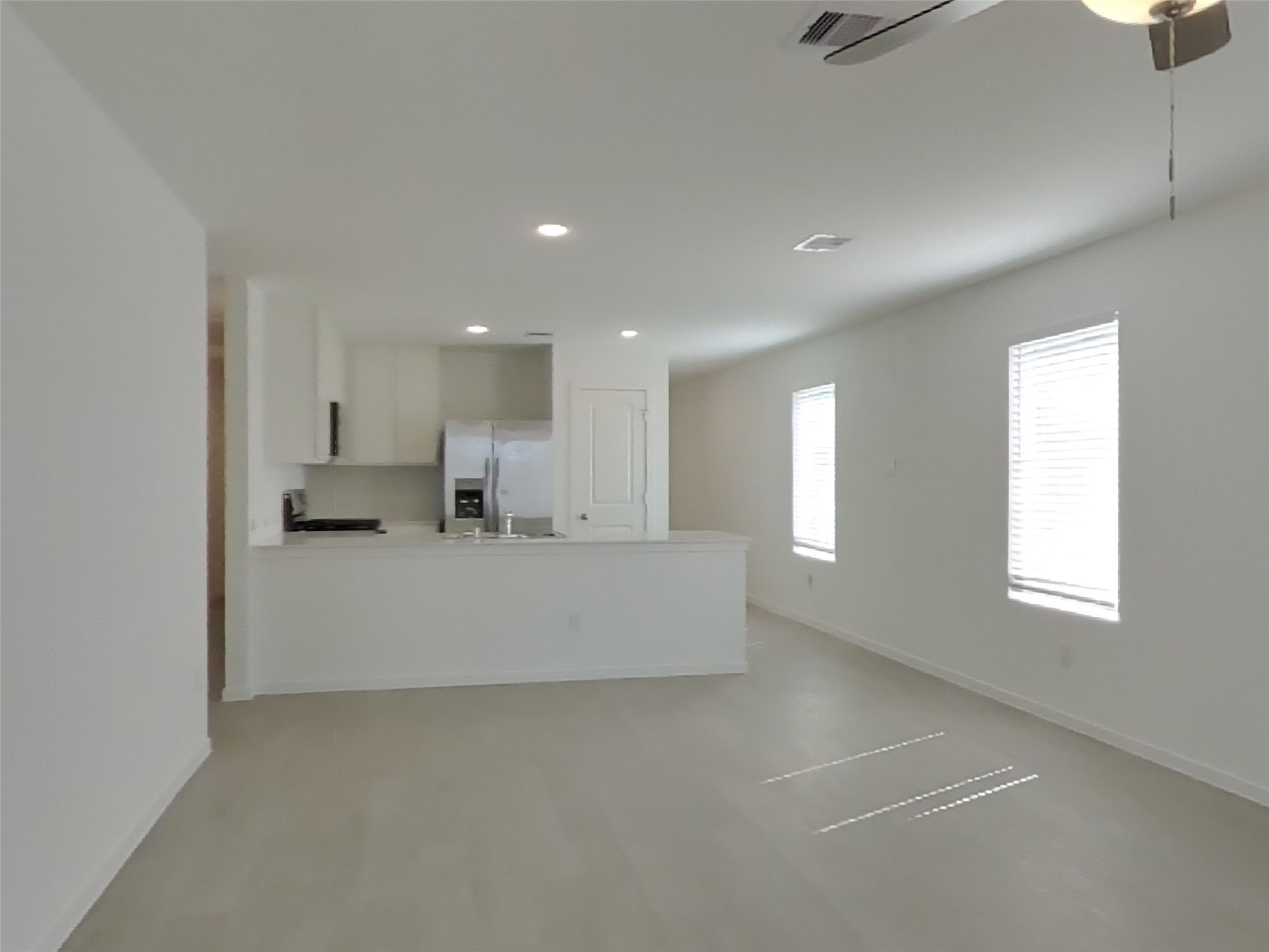 13035 Shells Lane Crosby, TX 77532 - Photo 4 of 17 a view of kitchen and windows
