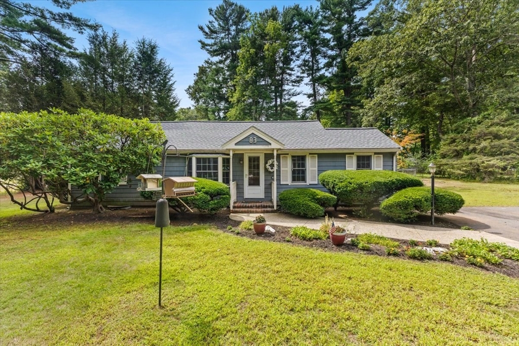 83 River Road Norfolk, MA 02056 - Photo 1 of 27 a house view with swimming pool and garden space