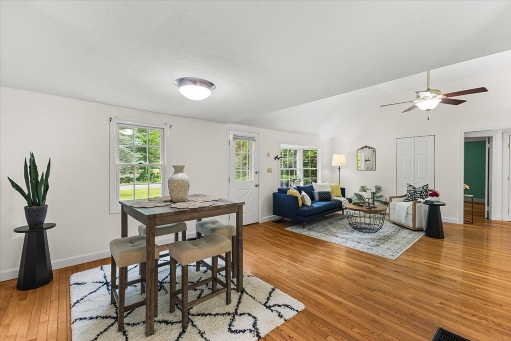 83 River Road Norfolk, MA 02056 - Photo 11 of 27 a view of a livingroom with furniture window and wooden floor