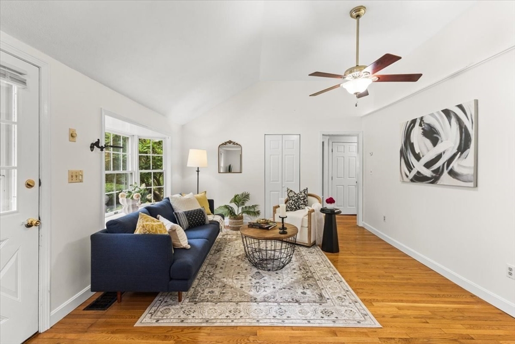 83 River Road Norfolk, MA 02056 - Photo 12 of 27 a living room with furniture and wooden floor