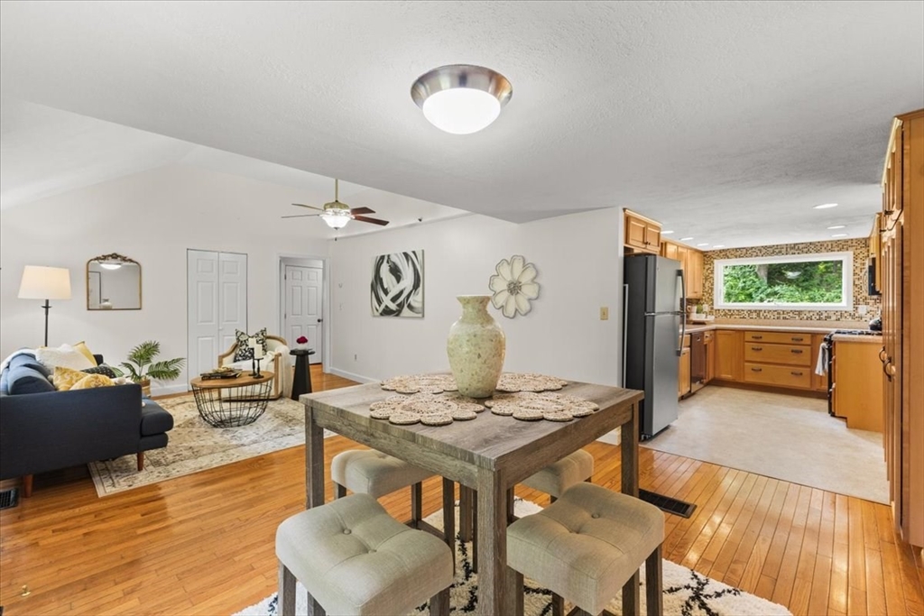 83 River Road Norfolk, MA 02056 - Photo 14 of 27 a living room with furniture and wooden floor