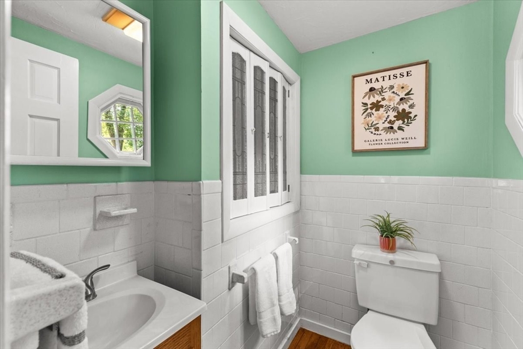 83 River Road Norfolk, MA 02056 - Photo 24 of 27 a bathroom with a toilet a sink and a bathtub