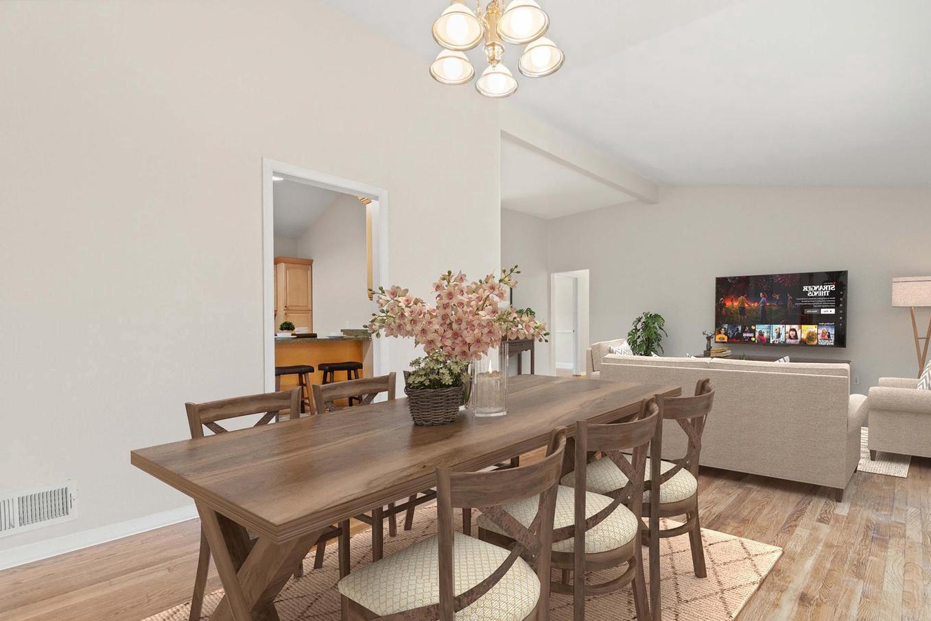 6505 Farley Street Springfield, VA 22152 - Photo 5 of 30 a view of a dining room with furniture and wooden floor