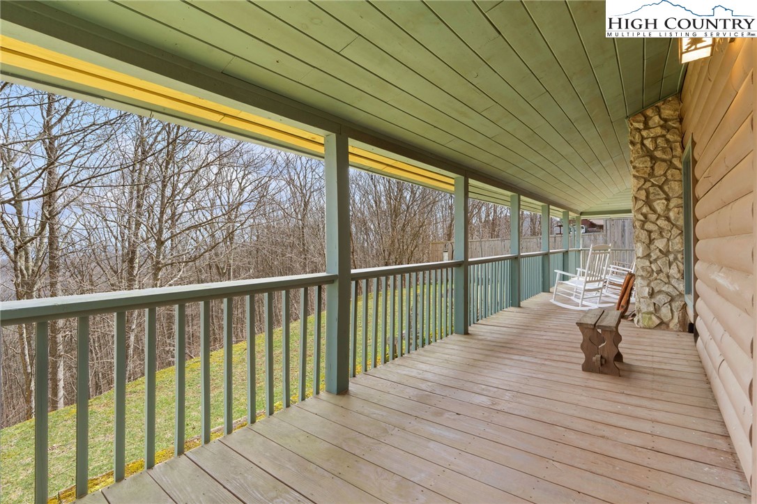 1748 Junaluska Road Boone, NC 28607 - Photo 30 of 37 a balcony with wooden floor