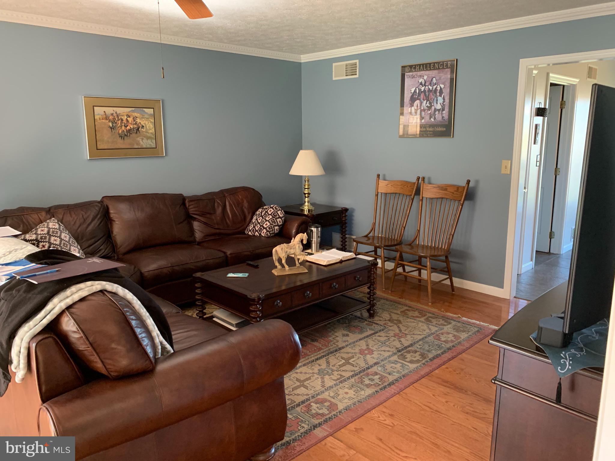 539 Rock Church Road Elkton, MD 21921 - Photo 12 of 43 Family room, hardwood floors, crown molding.