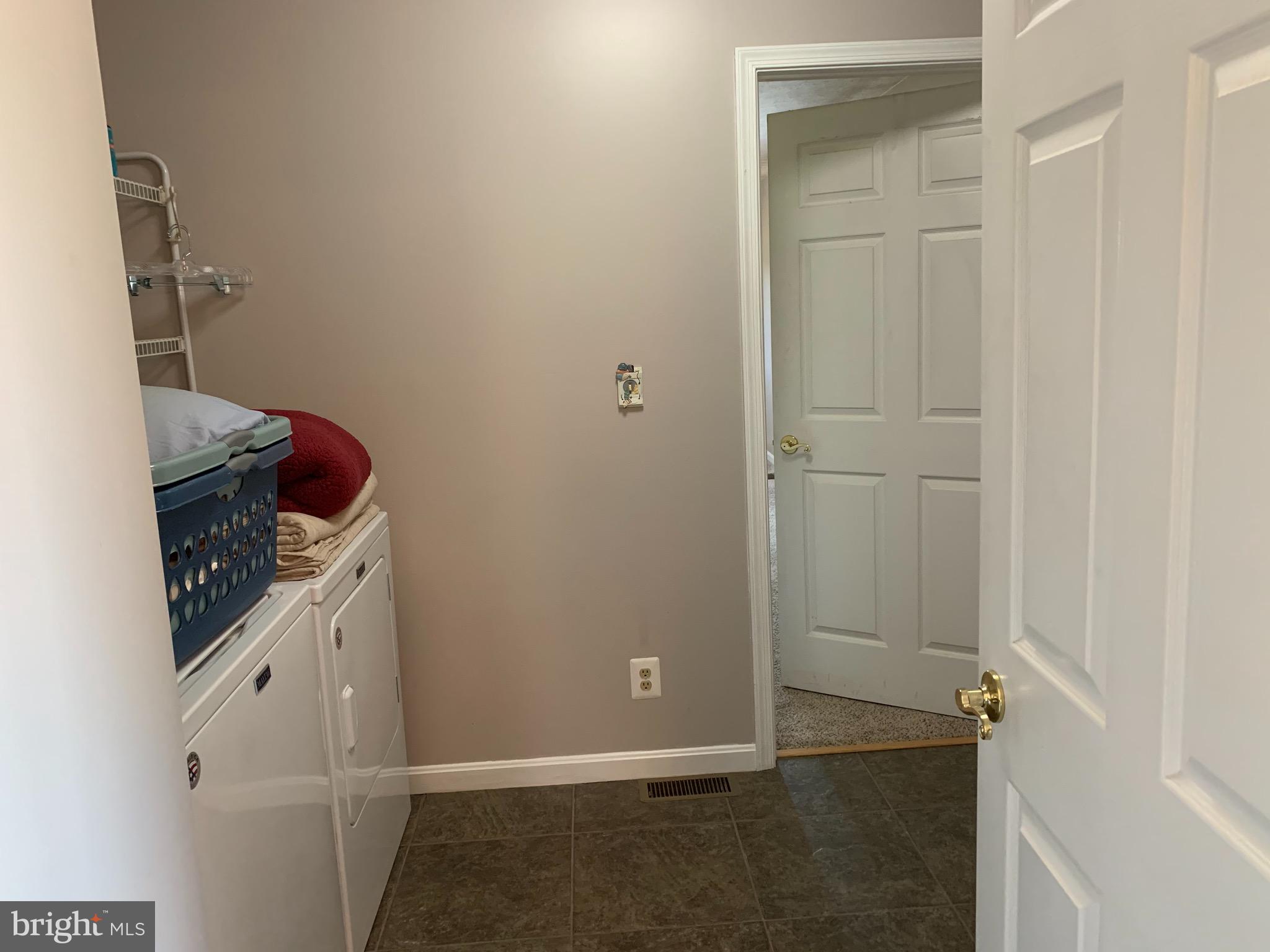 539 Rock Church Road Elkton, MD 21921 - Photo 15 of 43 Laundry, door to in-law space, closet & 1/2 bath.