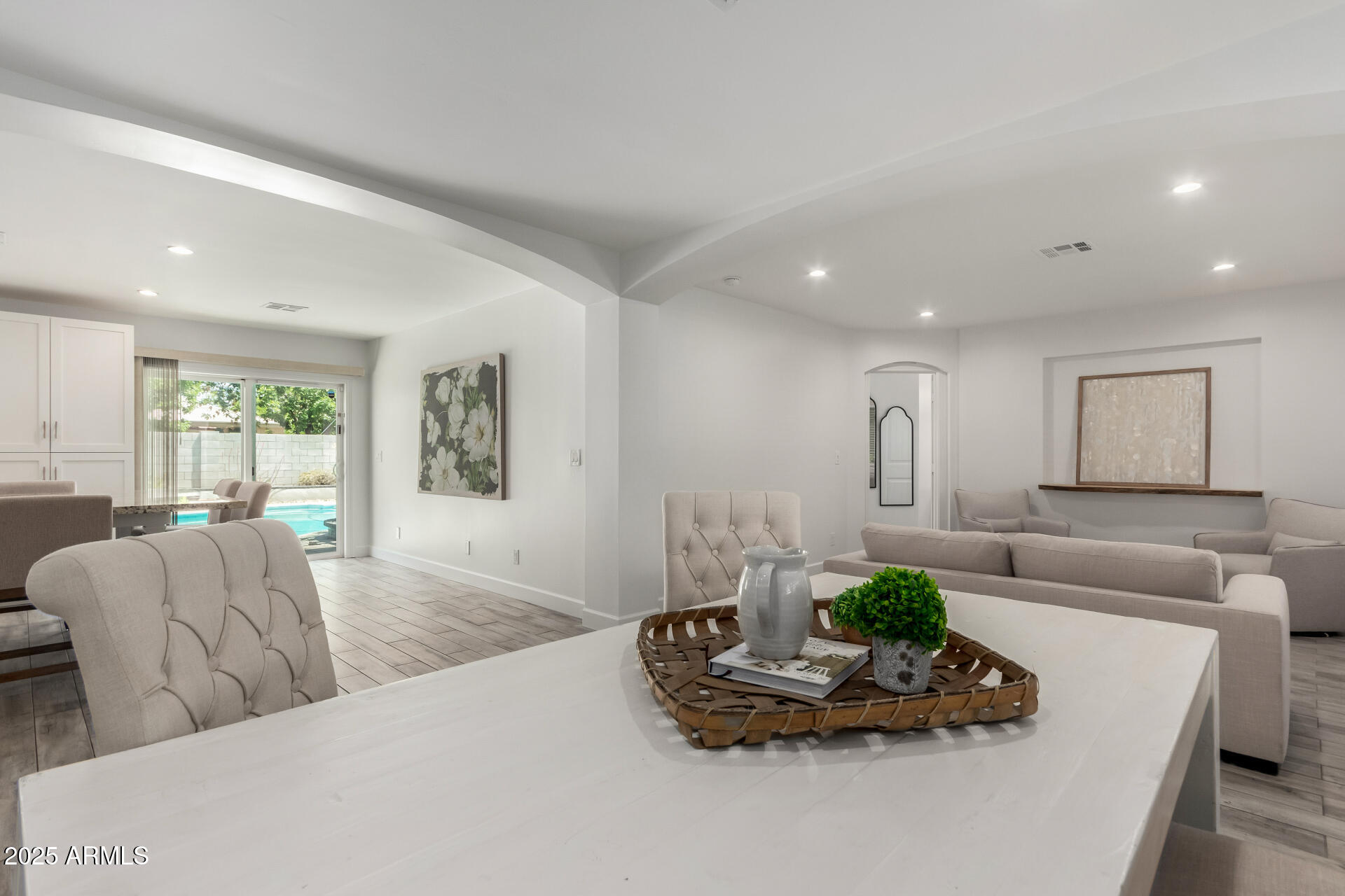 6741 North 10th Street Phoenix, AZ 85014 - Photo 14 of 37 a living room with furniture and a potted plant