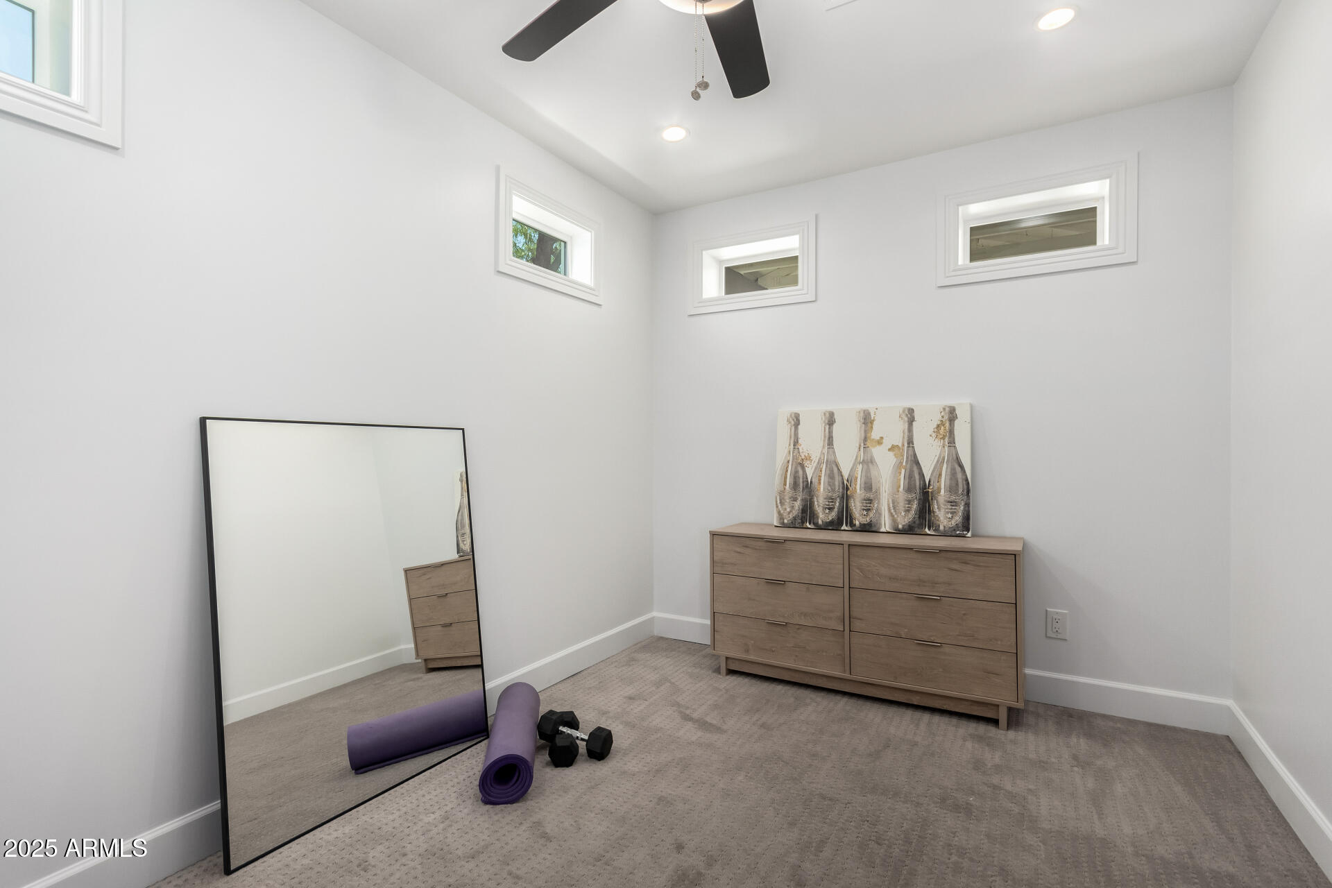 6741 North 10th Street Phoenix, AZ 85014 - Photo 18 of 37 a living room with furniture and a ceiling fan